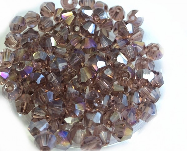 Bicone crystal 4mm - 100 pieces in zip bag - mid. amethyst shimmer