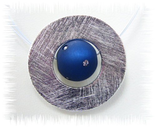 Creative pendant – disc- rhodinated