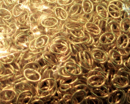 Binderinge/Ösen oval 5x7x0,8mm - 5 Gramm- ca. 60-65 Stück - Farbe: gold